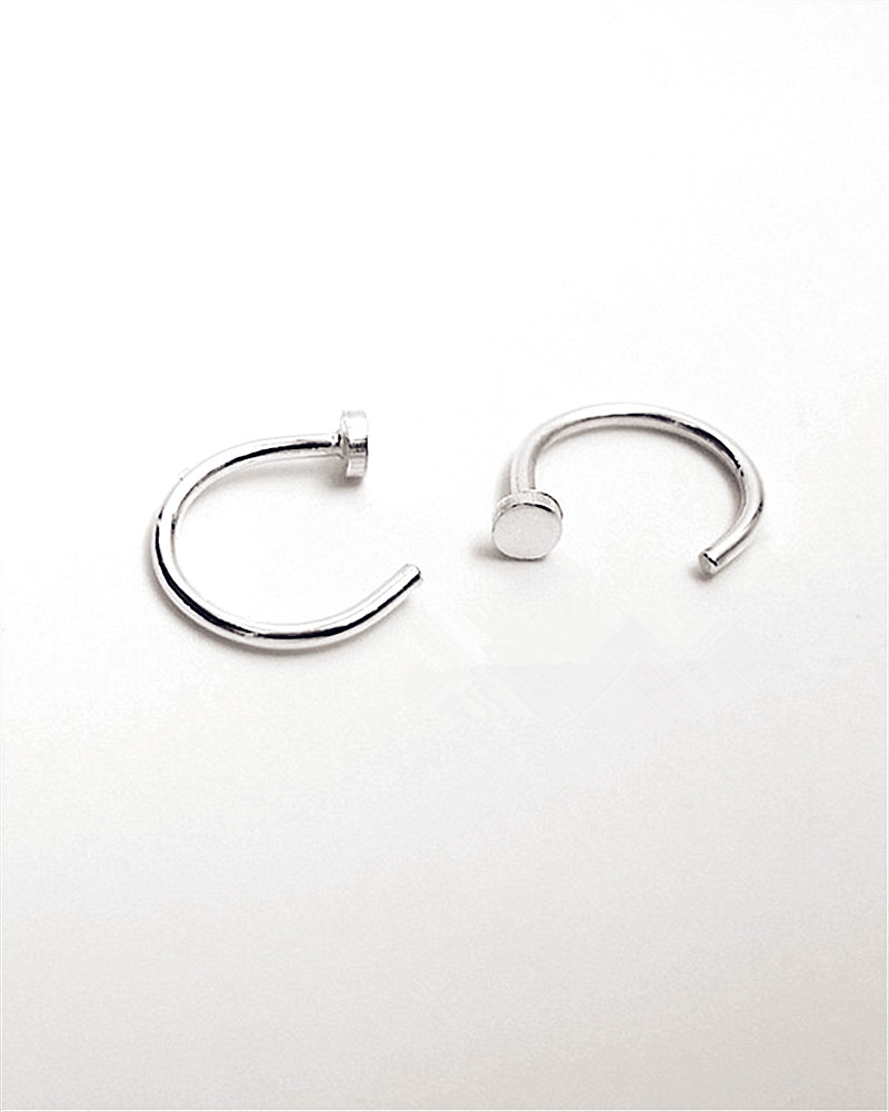 Sterling Silver Dotted Huggie Hoop Earrings main image 1